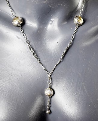Lot 70 - A white metal necklace with decorative links,...