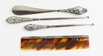 Lot 286 - A sterling silver and faux tortoiseshell comb,...