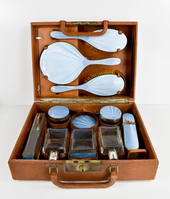 Lot 434 - A vintage travelling vanity case, housing a...