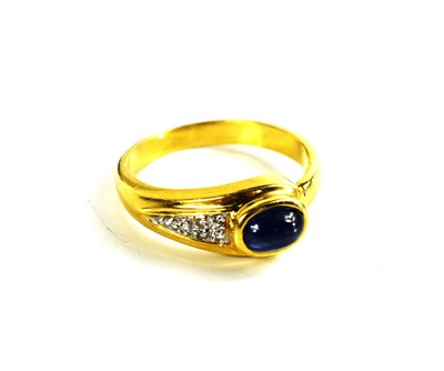 Lot 152 - An 18ct gold, cabochon sapphire and diamond...