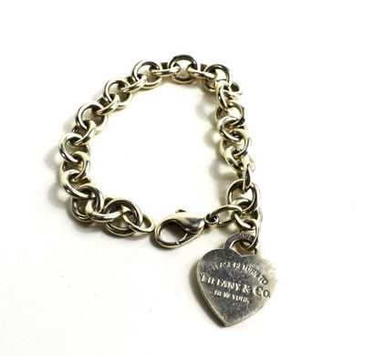 Lot 126 - A silver Tiffany charm bracelet, of large...