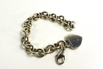 Lot 126 - A silver Tiffany charm bracelet, of large...