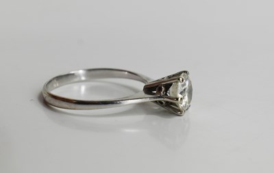 Lot 25 - An 18ct white gold and diamond solitaire dress...