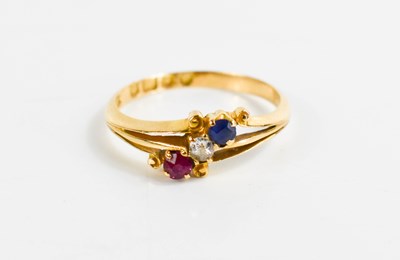 Lot 128 - An 18ct gold, diamond, ruby and sapphire ring,...