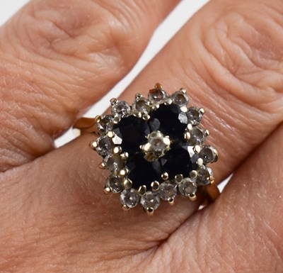 Lot 124 - A 9ct gold sapphire and paste dress ring of...