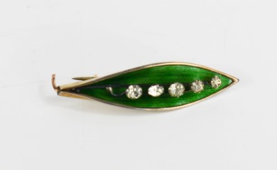 Lot 28 - An Art Nouveau enamel and gold lily of the...
