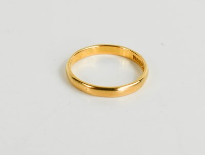 Lot 108 - A 22ct gold wedding band, size L, 2.43g.