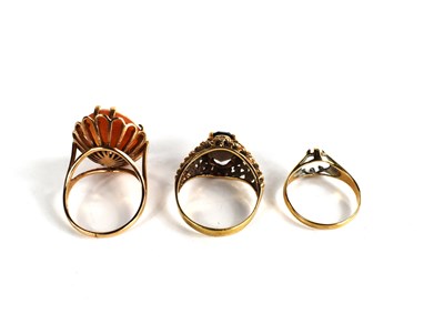 Lot 131 - Three 9ct gold rings, a cameo ring size N,...