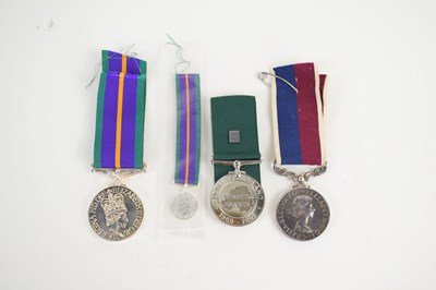 Lot 404 - A group of military medals to include a Long...