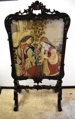 Lot 484 - A large Victorian mahogany firescreen, the...