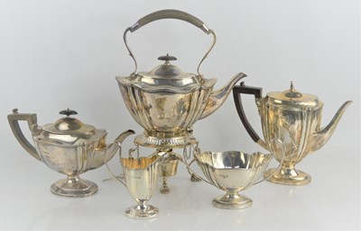 Lot 311 - A silver tea set with kettle and stand, of Art...