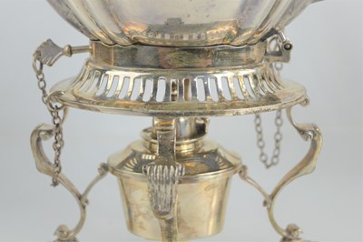 Lot 311 - A silver tea set with kettle and stand, of Art...