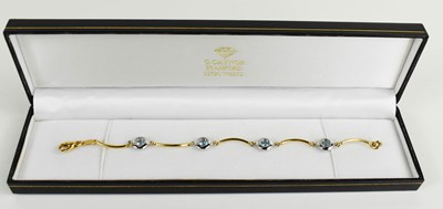 Lot 128 - An 18ct gold and white gold Italian bracelet...
