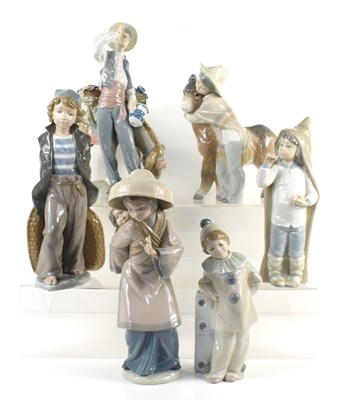 Lot 112 - A group of six Lladro figurines to include a...