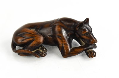 Lot 176 - A Japanese wooden netsuke, likely Meiji period,...