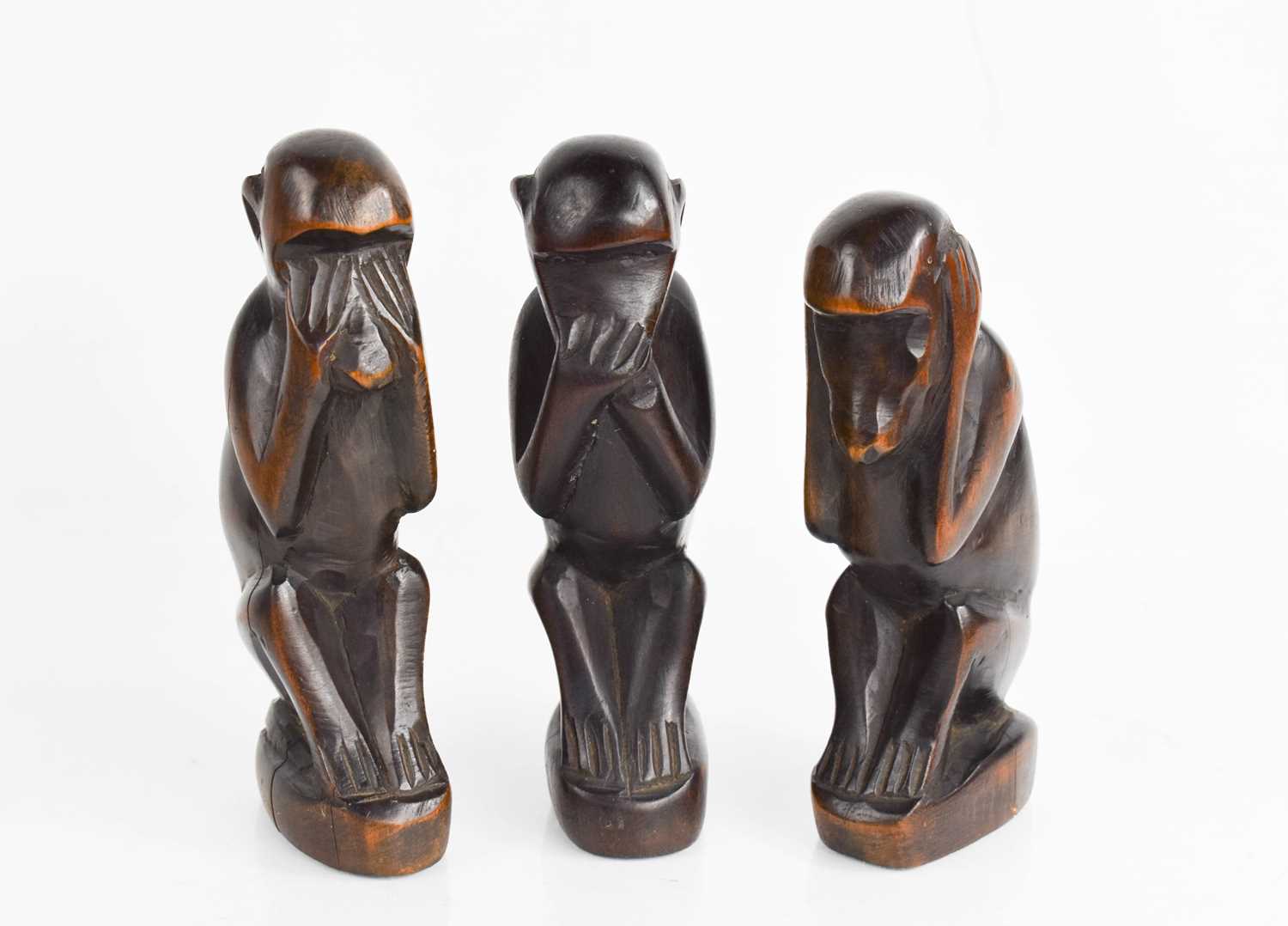 Lot 292 - A set of three hardwood carved monkeys, 'See...