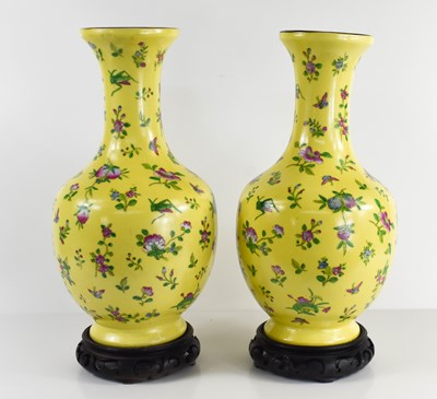 Lot 229 - A pair of Chinese vases, with yellow ground,...