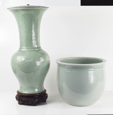 Lot 227 - A large 20th century celadon vase, raised on a...