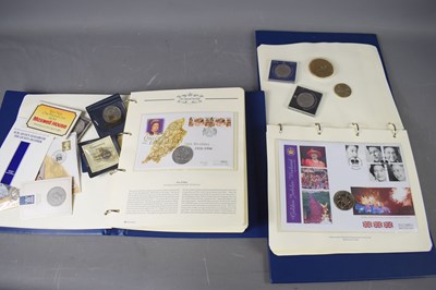 Lot 403 - Two albums of The Queens Golden Jubilee coin...