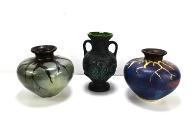 Lot 102 - A pair of studio pottery vases, one in a...