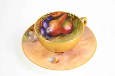 Lot 139 - A Royal Worcester miniature cup and saucer,...