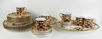 Lot 146 - A Royal Crown Derby dinner and tea service in...