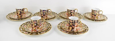 Lot 140 - A set of six Royal Crown Derby coffee cans and...