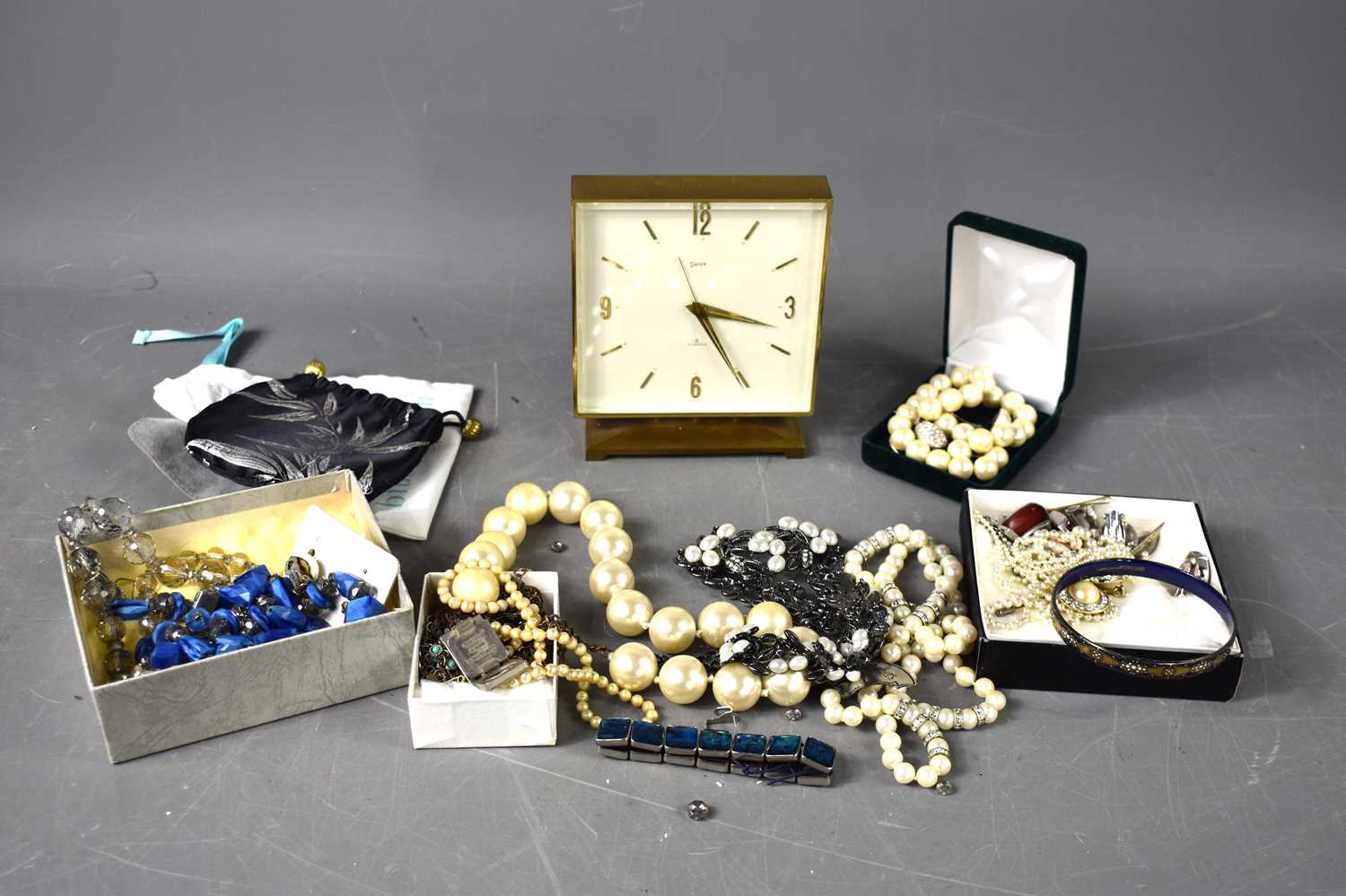Lot 308 - A Swiza seven jewels brass cased clock...