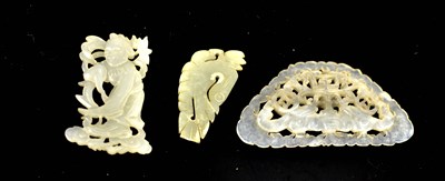 Lot 234 - A group of three 19th century nephrite jade...