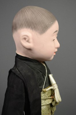 Lot 260 - An Ichimatsu doll, c.1960s, wearing hakama and...