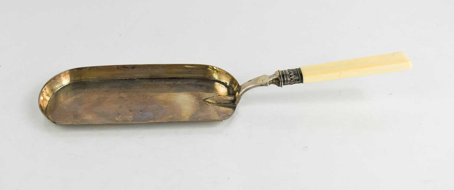 Lot 297 - A silver crumb scoop, with ivory handle,...