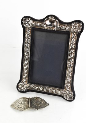 Lot 268 - A silver photograph frame, on velvet back and...