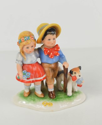 Lot 205 - A Goebel "Kathe Kruse" figure group, 1955,...