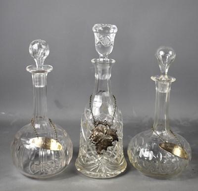 Lot 169 - A pair of cut glass antique decanters with...