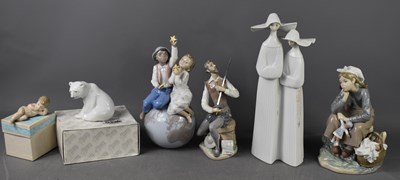 Lot 116 - A selection of Lladro, to include polar bear,...