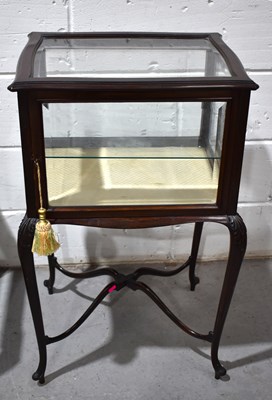 Lot 454 - A mahogany glass display cabinet on stand, the...