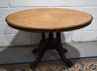 Lot 448 - A Victorian oval top marquetry inlaid tea...