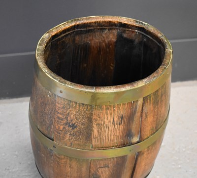 Lot 461 - A 19th century coopered oak barrel with brass...