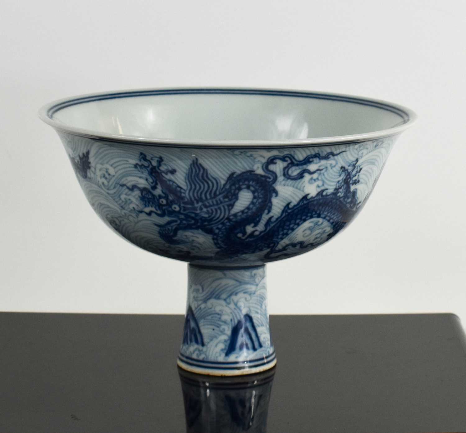 Lot 274 - A Chinese blue & white Ming Xuande Dragon high...