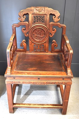 Lot 494 - A Chinese carved temple chair, the shaped back...