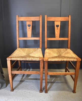 Lot 495 - A pair of Shaker style oak chairs, circa 1920,...