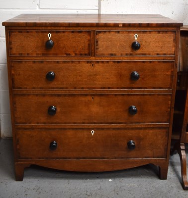 Lot 498 - A 19th century oak chest of drawers with two...