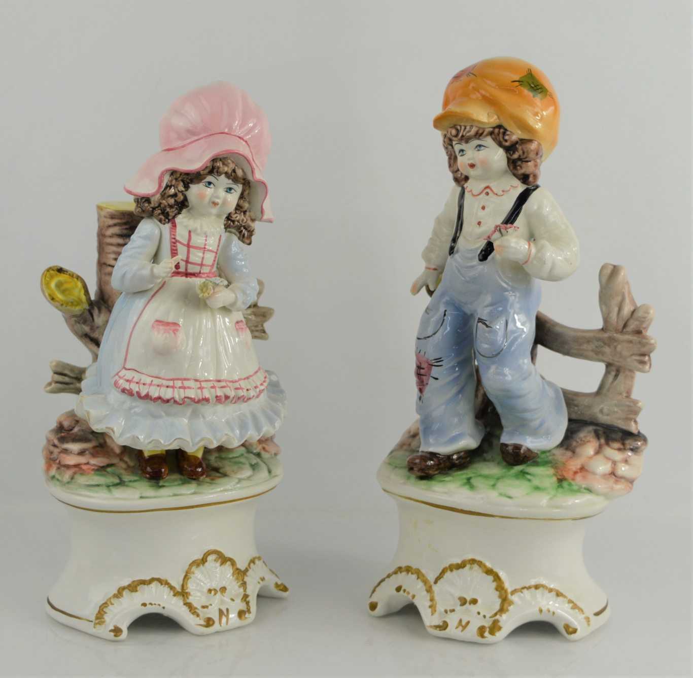 Lot 75 - Two large capodimonte porcelain figures, band...