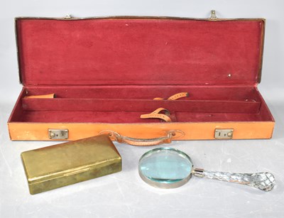 Lot 101 - A vintage leather shotgun case together with...