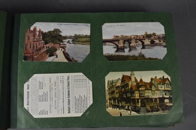 Lot 70 - An album of Edwardian and later postcards...