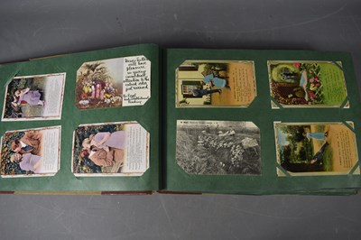 Lot 70 - An album of Edwardian and later postcards...