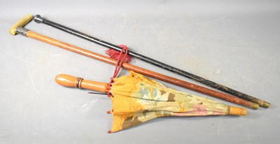 Lot 221 - A Victorian malacca cane with silver collar...