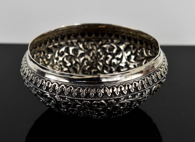 Lot 417 - A white metal Indonesian bowl, embossed with...