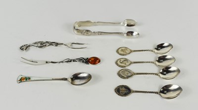 Lot 152 - A pair of silver sugar tongs, silver and amber...