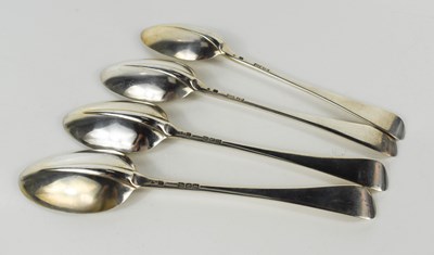 Lot 154 - A set of four Georgian silver serving spoons,...